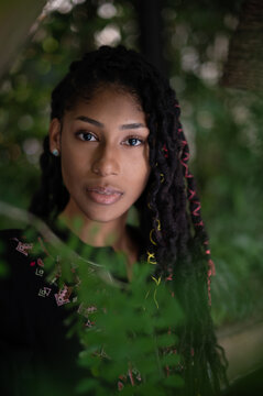 Portrait of confident attractive afro latina woman with dreadlocks