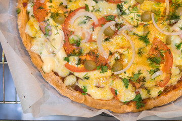 Homemade pizza. Pizza in the oven. Family evening. Homemade baking. Bake. Pizza. Leisure at home. Cooking. Recipes.