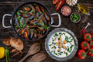 Moules mariniere, chowder, bouillabaisse and steamed mussels on the table
