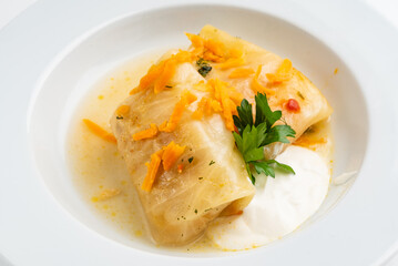 lahanodolmathes with broth based sauce and dill