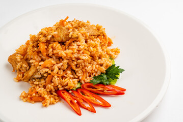 rice pilaf with meat, carrot and onion isolated on white background