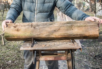 Carpenter's Hands Cutting Wood With Tablesaw