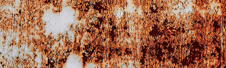Painted old grunge textured metal sheet surface with traces of strong and heavy rust. Background...