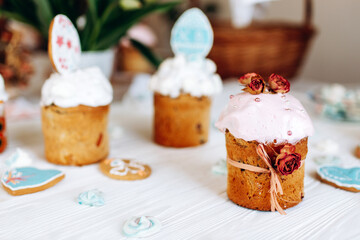 Easter. Homemade baking Easter cakes decorated with dried flowers on the table