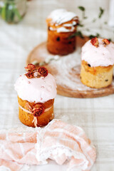 Easter. Homemade baking Easter cakes decorated with dried flowers on the table