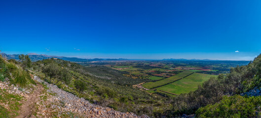Naklejka premium view from the landmark ermita santa magdalena, of the plane of the balearic island of mallorca, spain