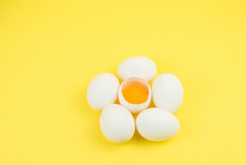 Eggs on the yellow background