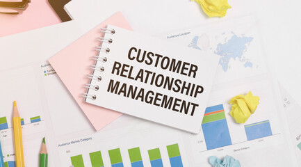 CRM, customer relationship management concepts with text on desk