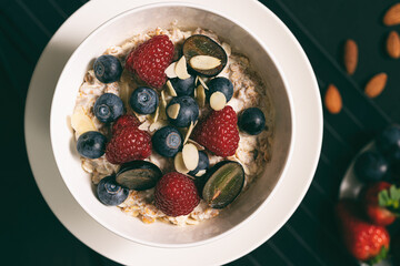 Oatmeal Porridge With Fresh Berries, Oats With Blueberry And Raspberry.Full frame.Top view.