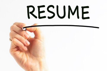 Hand writing inscription RESUME with marker, concept, stock image