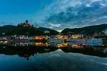 Fototapeta premium Moselle with city lights from Cochem at night, Germany..Imperial Castle of Cochem.
