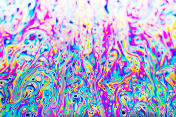 Beautiful psychedelic abstraction formed by light on the surface of a soap bubble