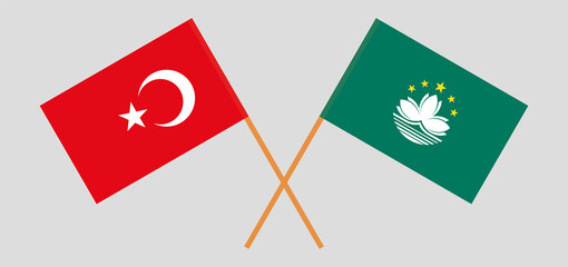Crossed flags of Turkey and Macau. Official colors. Correct proportion