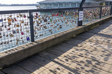 Love Locks locked on the fence at Lonsdale Quay Market in North Vancouver, Canada.
