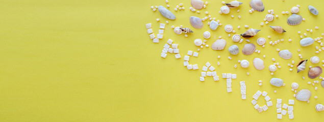 The word vacation is written on a yellow background Text in the upper right corner Letters from...