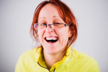 Funny ugly hispanic adult woman smile from a silly joke. Moron and dumb face portrait with mad...