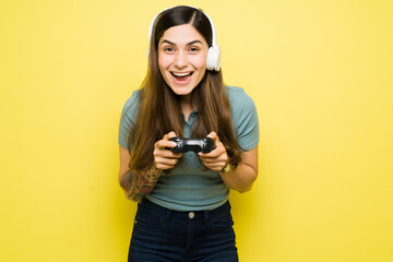 Beautiful woman having fun with a video game © AntonioDiaz