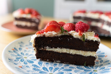 Strawberry Raspberry Chocolate Birthday Cake with White Cream Frosting