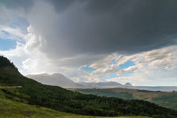 Obraz na płótnie Canvas dramatic summer landscape photo taken in Glacier national Park in Montana.