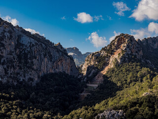 mountains with snow  and clouds in the tramuntana area on the balearic island of mallorca, spain