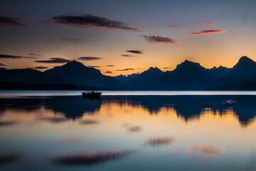 Fototapeta premium dramatic, peaceful and serene summer sunset photo of Lake McDonald in Glacier National Park in. Montana.