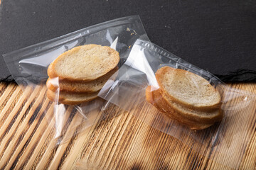 Toasted baguette slices in vacuum sealed plastic packaging