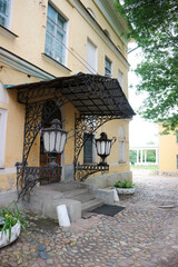 porch with beautiful large lanterns in the old house in the city