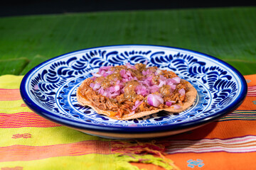 tostada, typical Mexican dish, made from cochinita pibil