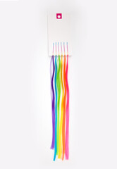 Artificial colored strands of hair