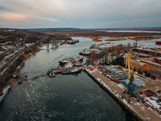 Naklejka premium Port on Don river at Rostov-on-Don, aerial view from drone in winter day