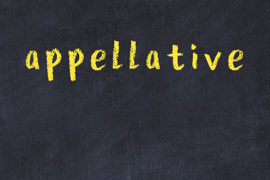 College chalk desk with the word appellative written on in