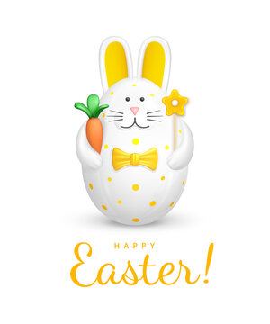 Happy Easter greeting card with text. Bunny shaped Easter Egg. Easter decoration - figurine of a white rabbit with a yellow bow tie, holding a carrot and a yellow flower