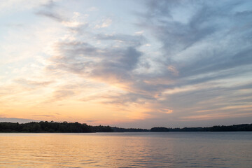 Fototapeta na wymiar Sunset by lake