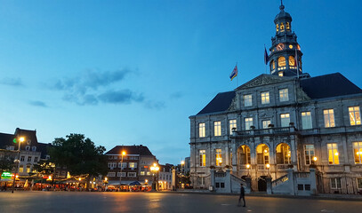 Fototapeta na wymiar Maastricht City Hall (Stadhuis) and Markt square at night, Netherlands