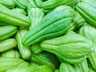 vegetable known as chayote, on a stall at an open market in Rio de Janeiro .