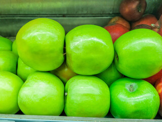 green apple on a stall at an open market in Rio de Janeiro.
