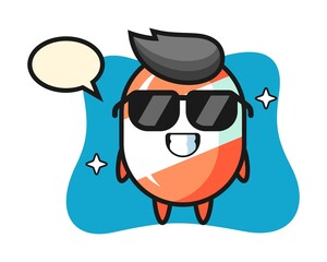 Cartoon mascot of candy with cool gesture