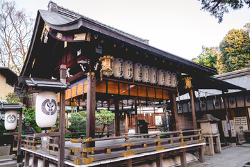 Beautiful wooden pavilion with paper lamps at Fushimi Inari taisha shrine, Kyoto, Japan