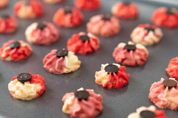 Homemade red and purple Chinese New Year bite size butter cookies
