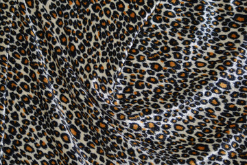 closeup of texture of print fabric stripes leopard