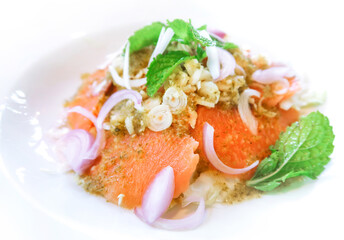 Salmon spicy salad in Thai style