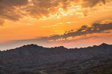 dramatic summer sunset in the Badlands national park in South Dakota.