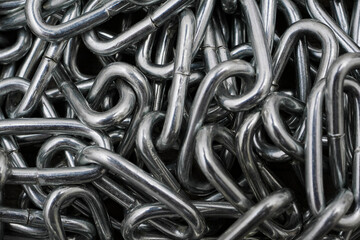 macro of metal chain links in heap