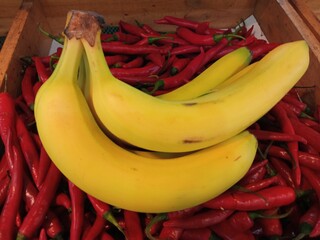 The bananas on the stacked chilies