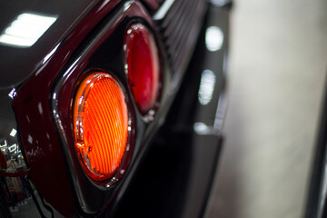 rear chrome bumper with red retro car headlights