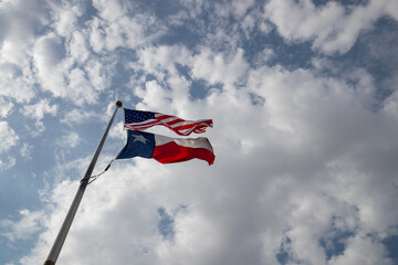 Texas and American flags on flag pole