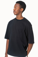 Man in simple black tee studio portrait