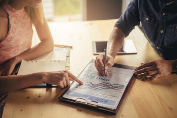 Businessman using hand gesture while explain business plan and discussion in the meeting. Selected focus