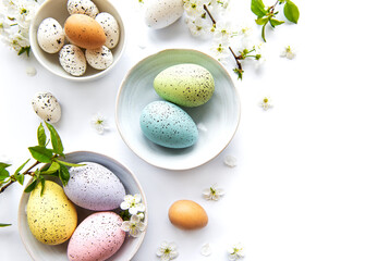 Colorful Easter eggs with spring blossom flowers