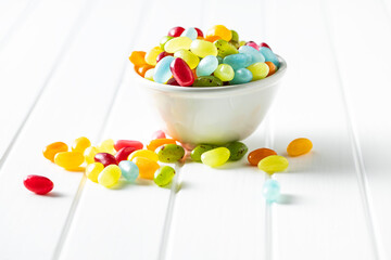 Sweet colorful jelly beans in bowl.